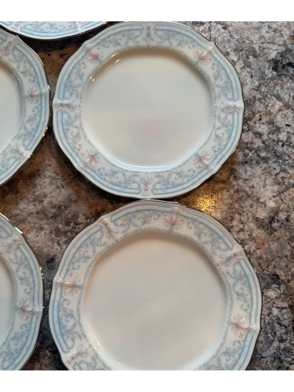 Noritake Crown Flower Dinnerware with Pale Blue and Soft Pink Floral Border
